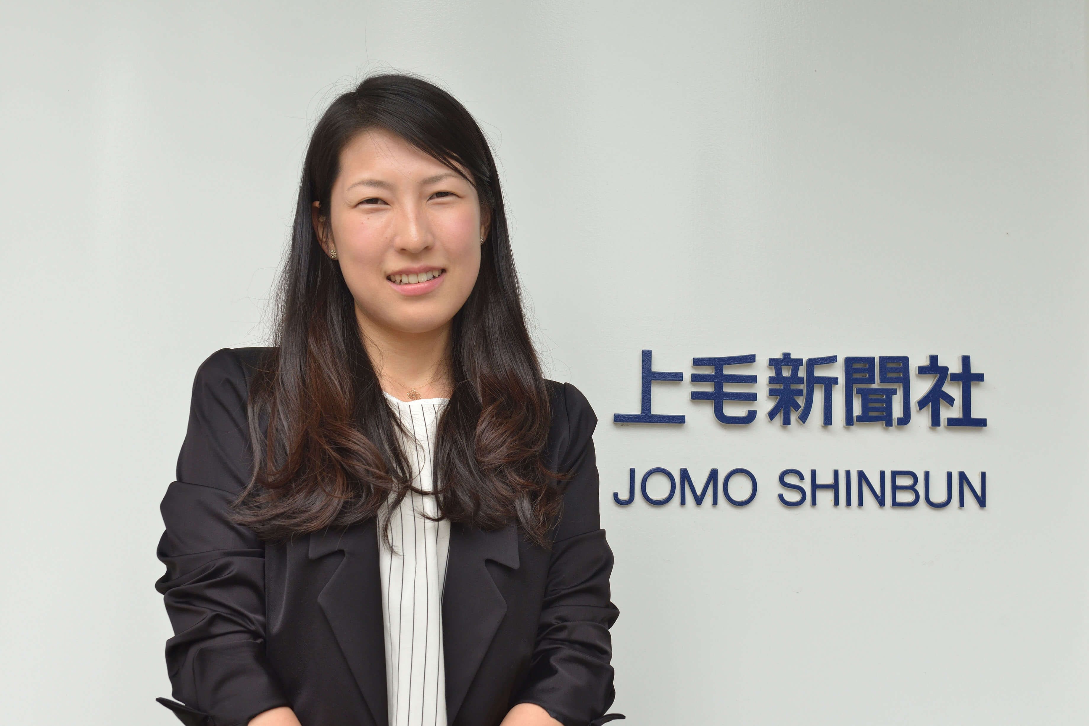 毛 社 上 新聞